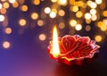 Diya lamp lit during diwali celebration