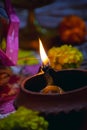 A diya is an oil lamp made from clay or mud with a cotton wick dipped in ghee. Diyas are native to the Indian subcontinent and