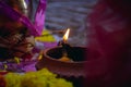 A diya is an oil lamp made from clay or mud with a cotton wick dipped in ghee. Diyas are native to the Indian subcontinent and