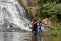 Local People take a selfie Sunny day in the Tropical waterfall falls from the