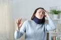 Dizzy woman wearing neck brace at home Royalty Free Stock Photo