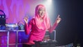 Dj artist using professional mixer console in nightclub Royalty Free Stock Photo