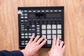 a dj audio producer fingers play the drum music on pads of drum machine Royalty Free Stock Photo