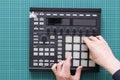 a dj audio producer fingers play the drum music on pads of drum machine Royalty Free Stock Photo