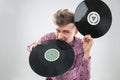 DJ biting vinyl record Royalty Free Stock Photo