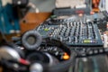 DJ console. Amplifying equipment, studio audio mixer knobs and faders. Music production, creation. Royalty Free Stock Photo