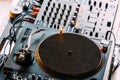 DJ Equipment Deck With Music Track Control And Mixer At Club Party