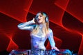 DJ girl on decks at the party Royalty Free Stock Photo