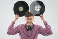 DJ having fun with vinyl record showing Mickey Royalty Free Stock Photo