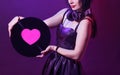 Dj headphone equipment disco girl party retro vintage ultraviolet mixer young woman vinyl glamor valentine`s day plastic pink Royalty Free Stock Photo