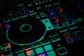 MPC style pads on DJ Controller with Colorful dark DJ Jog Wheel & Bass Treble Mid Level knobs Royalty Free Stock Photo