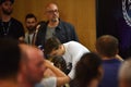 Dj Martin Garrix signs autographs for fans at a press conference