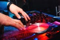 DJ mix music hands on professional music equipment for CDs with buttons and controllers Royalty Free Stock Photo