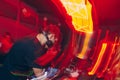 DJ mixer in a nightclub with moving motion abstract continuous lines glowing colored lights from controllers and buttons in the ni