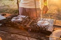 Dj and Mixer. Summer party on the beach Lido