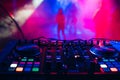 DJ mixer on the table background the night club Royalty Free Stock Photo