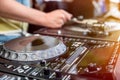 Dj mixes the track in club