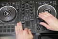 Dj mixing the music. Music background, banner. Close-up. Modern technologies Royalty Free Stock Photo