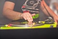 DJ mixing music on vinyl record at the night club Royalty Free Stock Photo