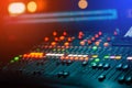 DJ Music mixer mixing console in nightclub to control sound with bokeh Royalty Free Stock Photo