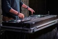 Dj playing disco house progressive electro music at the concert. DJ hands on equipment Royalty Free Stock Photo