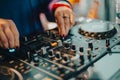 Dj playing disco house progressive electro music at the concert. DJ hands on equipment Royalty Free Stock Photo