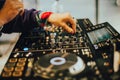 Dj playing disco house progressive electro music at the concert. DJ hands on equipment Royalty Free Stock Photo