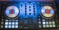 DJ plays and mix music on digital mixer controller. Close-up DJ performance controller, digital midi turntable system Royalty Free Stock Photo