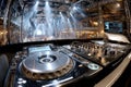 DJ setup overlooking a crowded dance floor Royalty Free Stock Photo
