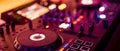 DJ Spinning, Mixing, and Scratching in a Night Club. DJ playing music at mixer . Closeup. Party. Royalty Free Stock Photo