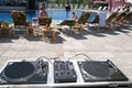 DJ stand near a pool