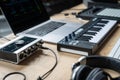 DJ tools for creating electronic music on a wooden table Royalty Free Stock Photo