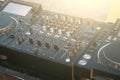 DJ turntable deck mixer close up, sound equipment, audio control panel for party, night clubs or music studio Royalty Free Stock Photo