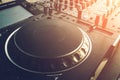 DJ turntable deck mixer close up, sound equipment, audio control panel for party, night clubs or music studio Royalty Free Stock Photo