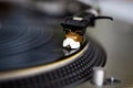 Vinyl record on analog turntable player device in studio Royalty Free Stock Photo