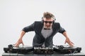 DJ in tuxedo mixing by turntable Royalty Free Stock Photo