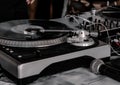 Dj uses turntable and mixer for scratching Royalty Free Stock Photo