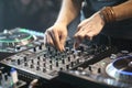 DJ using sound controller to mix music Royalty Free Stock Photo