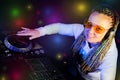 Dj woman playing music by mikser Royalty Free Stock Photo