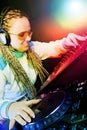 Dj woman playing music by mikser Royalty Free Stock Photo