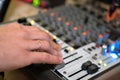 DJ working on a audiomixer at a nightclub Royalty Free Stock Photo