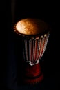 Djembe. Typical African percussion on a black background Royalty Free Stock Photo