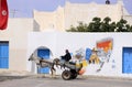 Man on Old Wagon with Colorful Graffiti Art, Djerba, Travel Tunisia