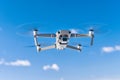 DJI Mavic 2 pro drone during flight against blue sky