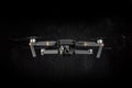 DJI Mavic Pro drone - Flying in the dark, on black background. Closeup on dark. One of the most portable drones in the