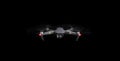 DJI Mavic Pro drone - Flying in the dark, on a black background. Closeup on dark. One of the most portable drones in the