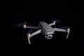 DJI Mavic 2 Pro - Flying in the dark, on black background. Closeup on dark. One of the most portable drones in the