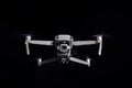 DJI Mavic 2 Pro - Flying in the dark, on black background. Closeup on dark. One of the most portable drones in the