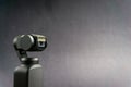 DJI Osmo Pocket stabilized handheld camera close up on black background