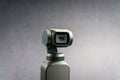 DJI Osmo Pocket stabilized handheld camera close up on black background